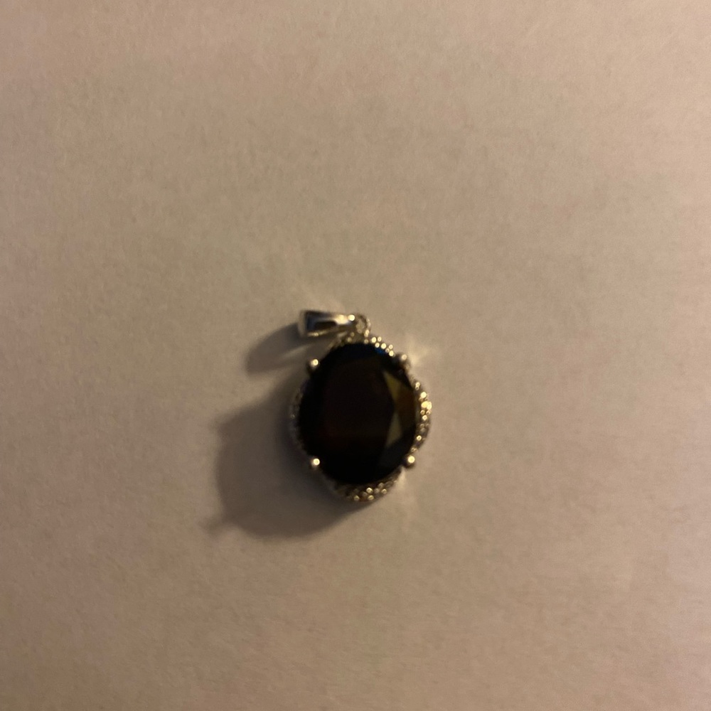 5.11 ct Oval Garnet and Diamond Pendant